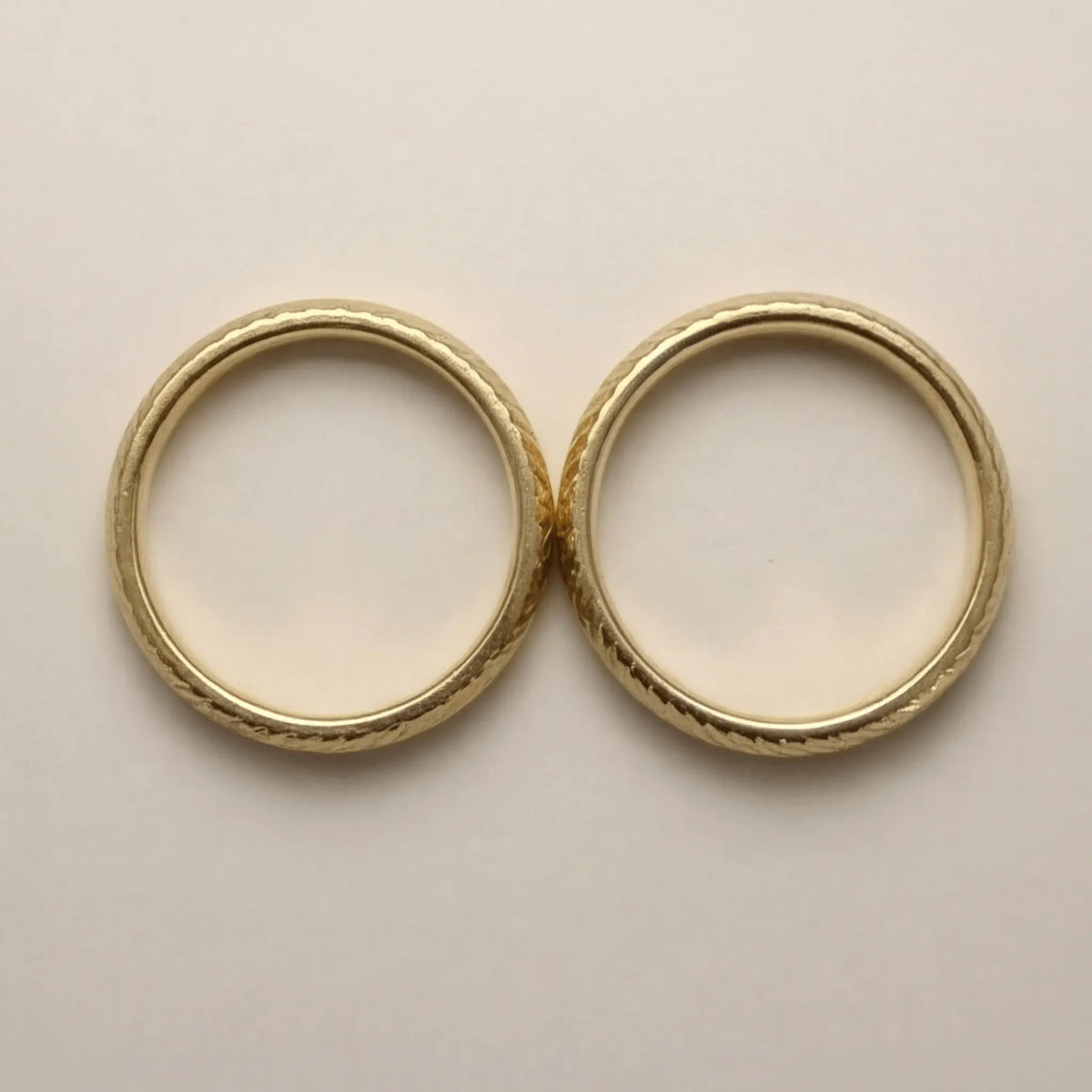 Spiral Wave 5mm gold wedding band by Majestic Jewellery