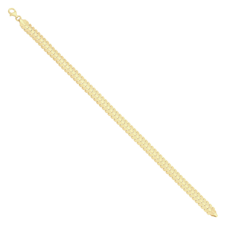 Solid gold herringbone bracelet, 8.55 g — shown at an angle across the frame.