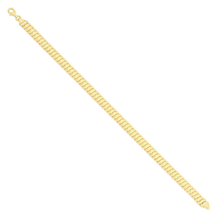 Solid gold braided bracelet, 7.15 g — shown at an angle across the frame.
