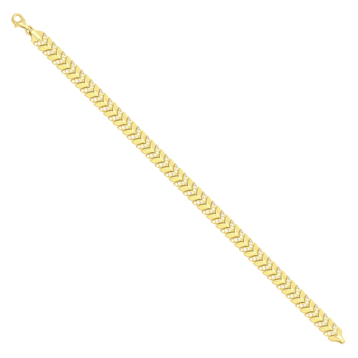 Solid gold herringbone bracelet, 9.85 g — shown at an angle across the frame.
