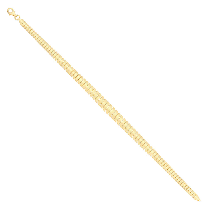Solid gold braided bracelet, 7.10 g — shown at an angle across the frame.