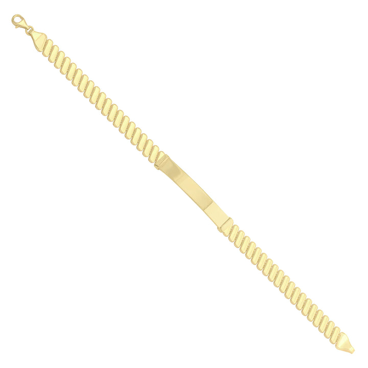 Solid gold id bracelet, 7.95 g — shown at an angle across the frame.