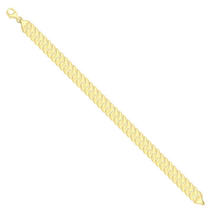 Solid gold curb bracelet, 10.05 g — shown at an angle across the frame.