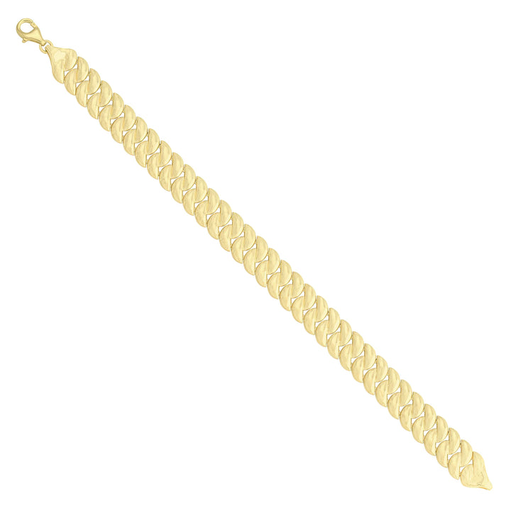 Solid gold curb bracelet, 12.65 g — shown at an angle across the frame.