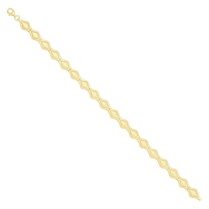 Solid gold fancy link bracelet, 7.25 g — shown at an angle across the frame.