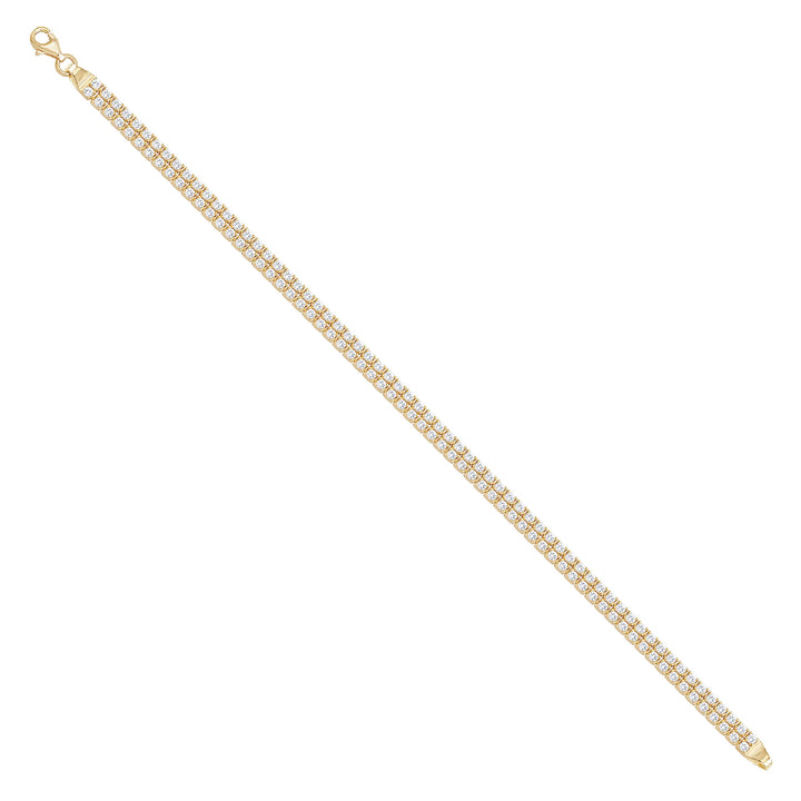 Solid gold tennis bracelet, 10.15 g — shown at an angle across the frame.