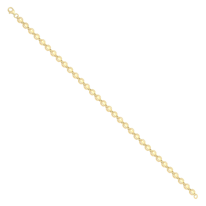 Solid gold bead bracelet, 8.10 g — shown at an angle across the frame.