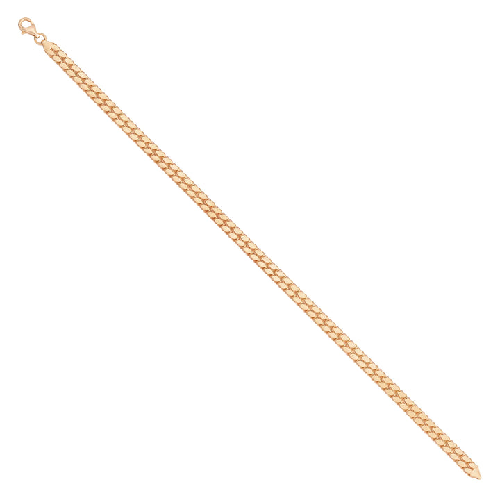 Solid gold braided bracelet, 5.55 g — shown at an angle across the frame.