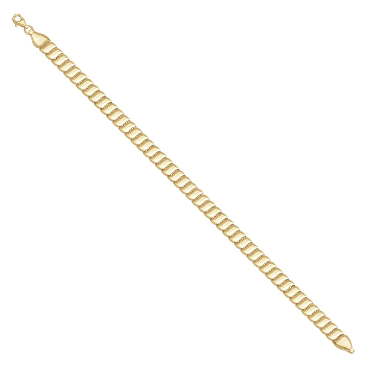 Solid gold braided bracelet, 7.45 g — shown at an angle across the frame.