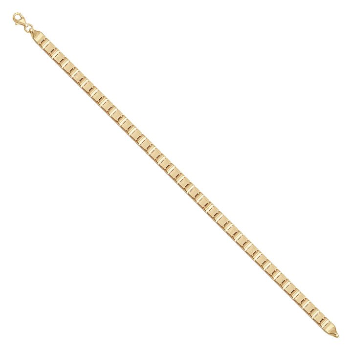 Solid gold id bracelet, 8.30 g — shown at an angle across the frame.