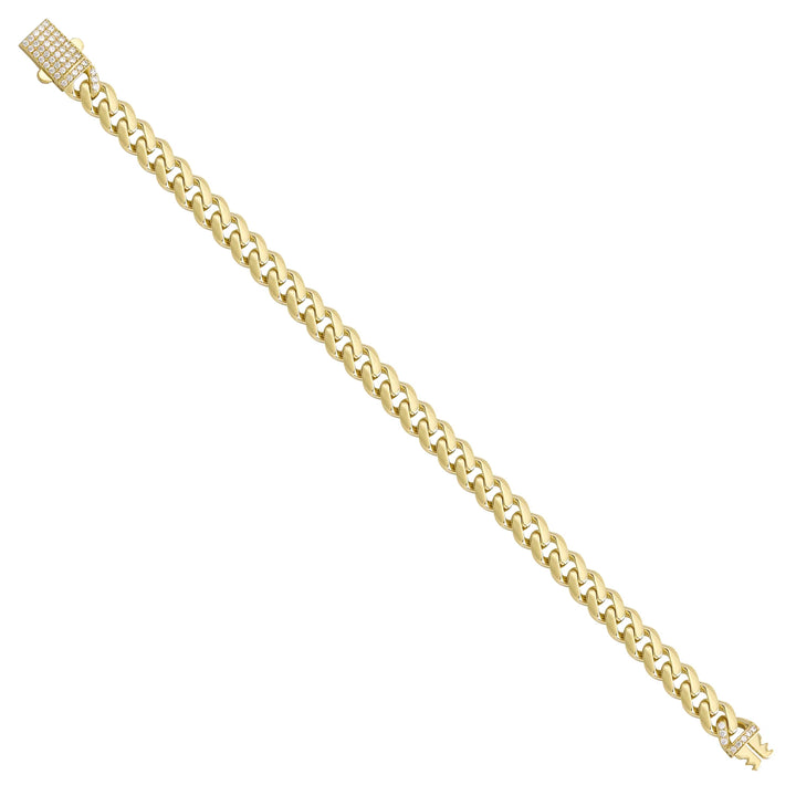 Solid gold curb bracelet, 10.55 g — shown at an angle across the frame.