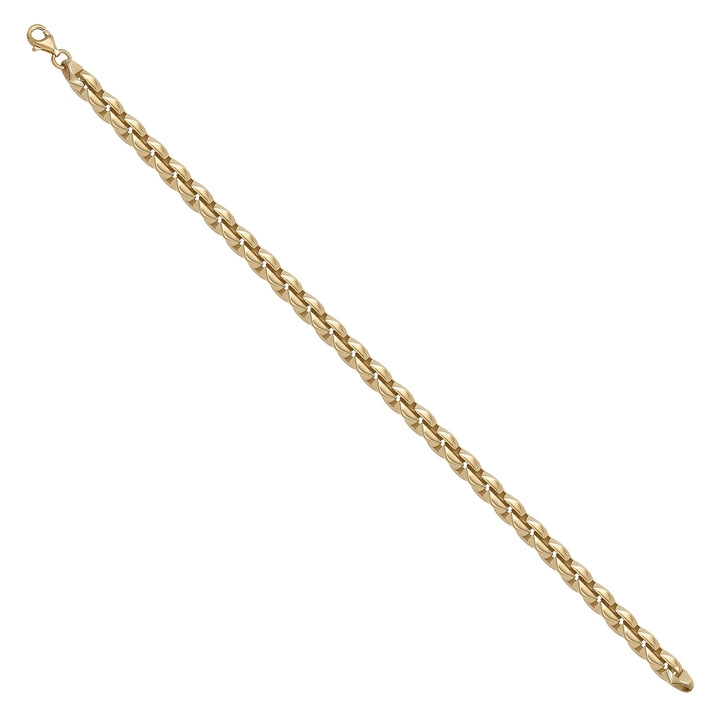 Solid gold fancy link bracelet, 6.65 g — shown at an angle across the frame.