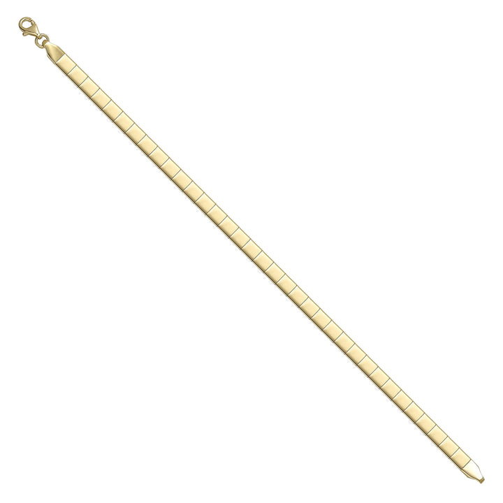 Solid gold id bracelet, 5.65 g — shown at an angle across the frame.