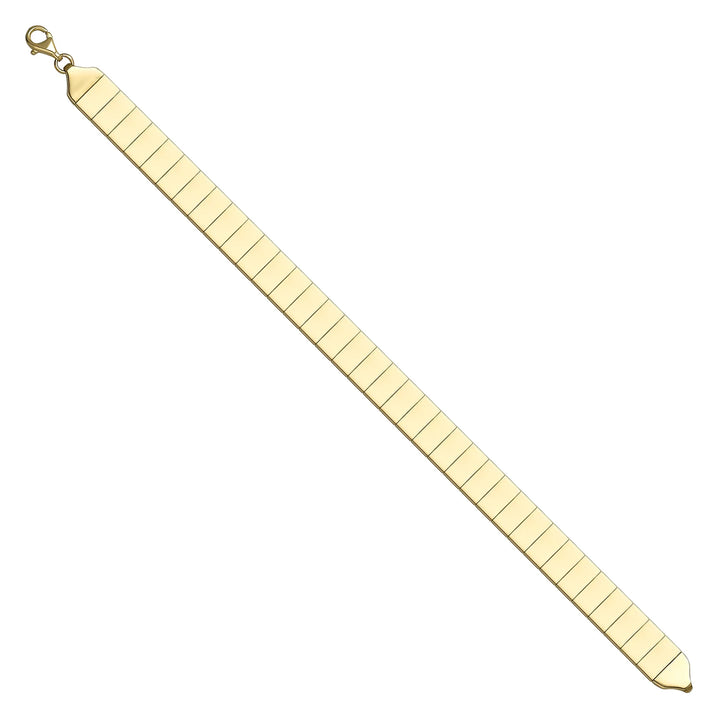 Solid gold id bracelet, 9.10 g — shown at an angle across the frame.
