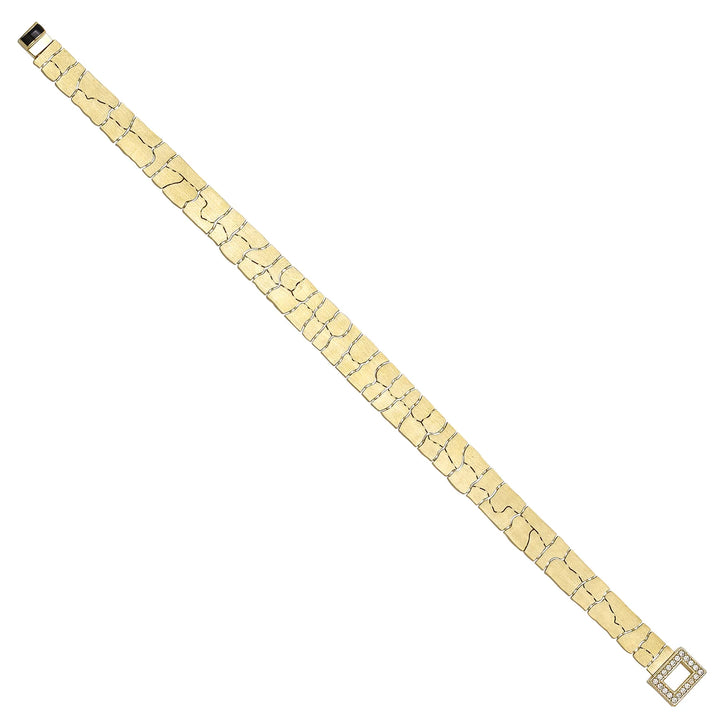Solid gold fancy link bracelet, 12.50 g — shown at an angle across the frame.