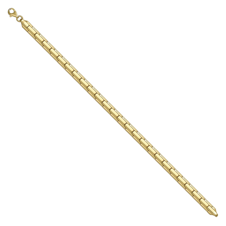 Solid gold brick link bracelet, 8.55 g — shown at an angle across the frame.