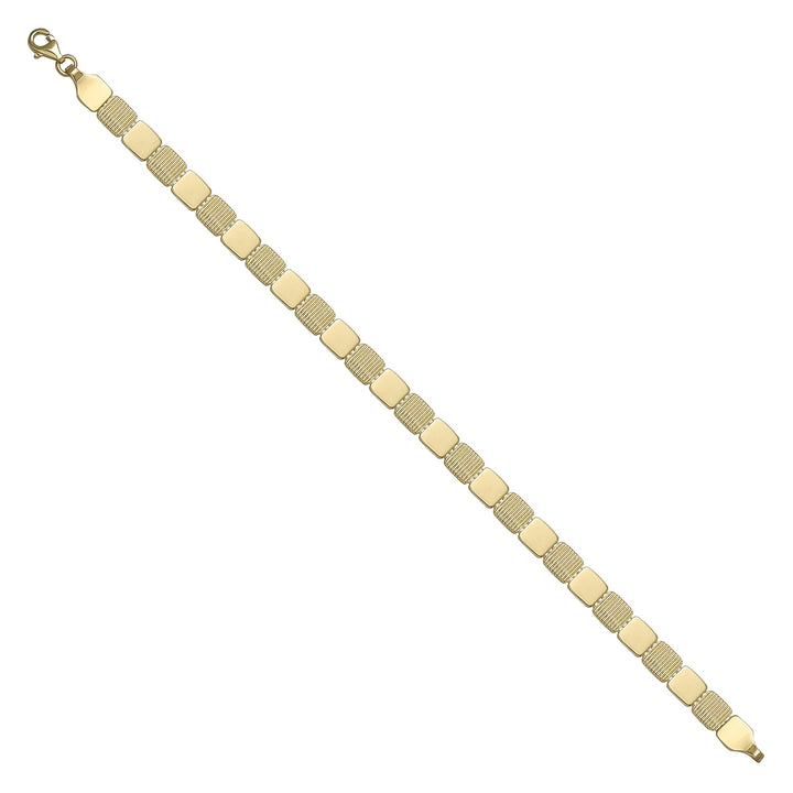 Solid gold id bracelet, 8.76 g — shown at an angle across the frame.