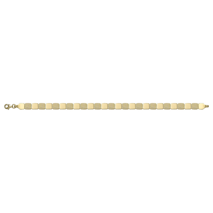 Solid gold id bracelet, 8.76 g — shown square on a plain background.
