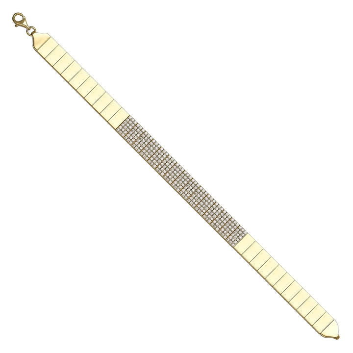 Solid gold tennis bracelet, 10.84 g — shown at an angle across the frame.