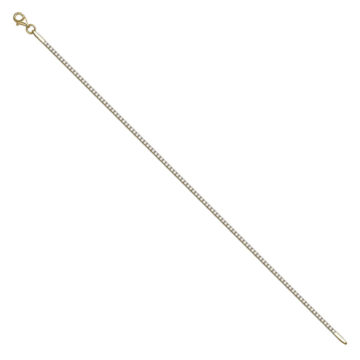Solid gold tennis bracelet, 3.60 g — shown at an angle across the frame.