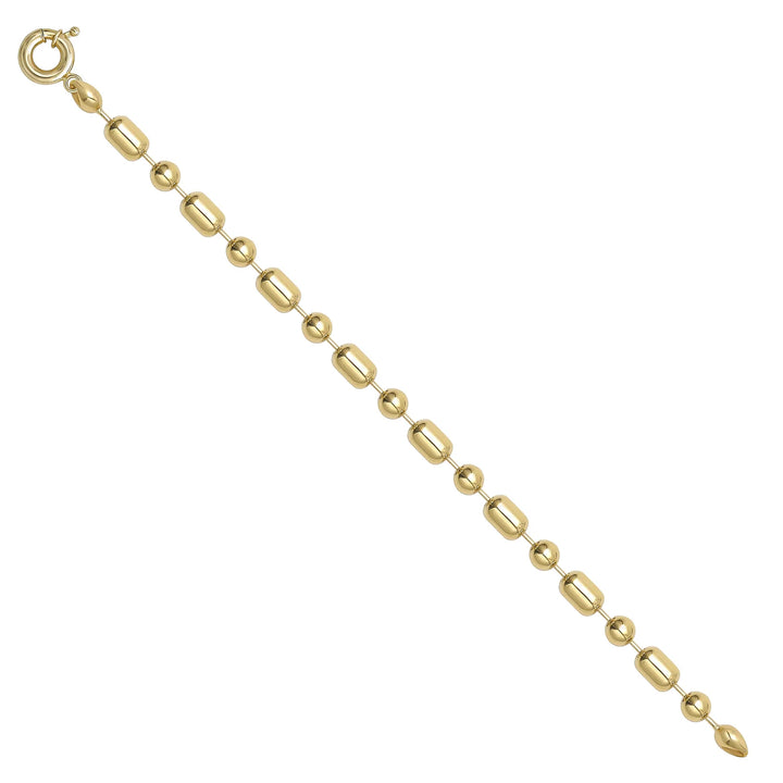 Solid gold bead bracelet, 9.55 g — shown at an angle across the frame.