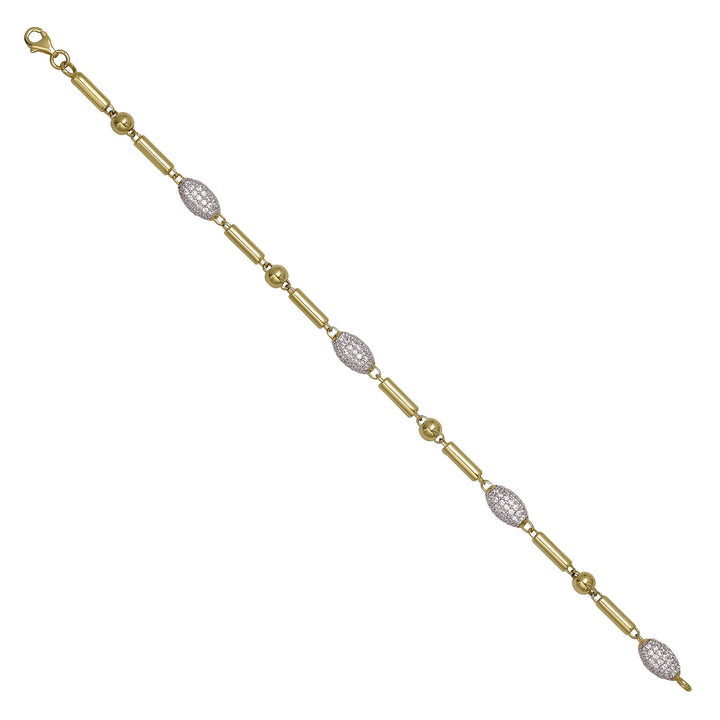 Solid gold bead bracelet, 7.10 g — shown at an angle across the frame.