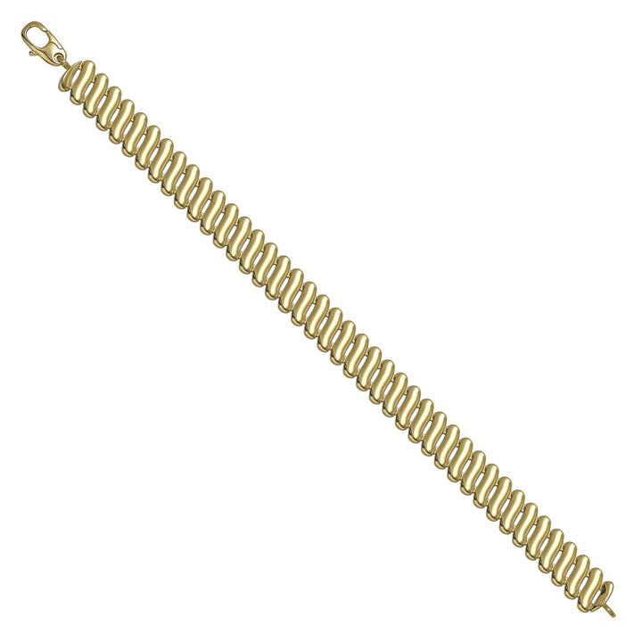 Solid gold braided bracelet, 7.70 g — shown at an angle across the frame.